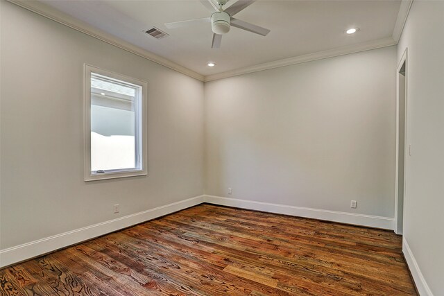 spare room with crown molding, hardwood / wood-style floors, and ceiling fan