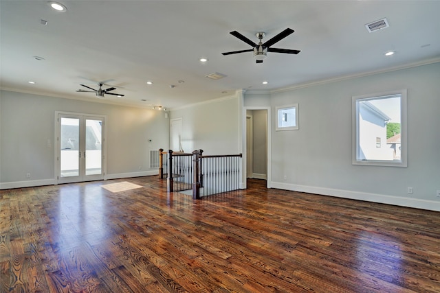 unfurnished room with ornamental molding, hardwood / wood-style floors, and ceiling fan