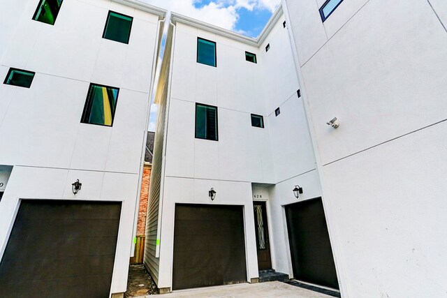 view of building exterior with a garage