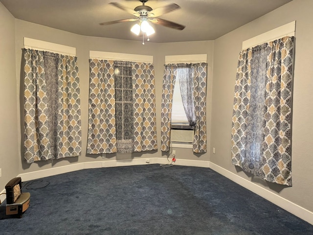 spare room with ceiling fan, carpet flooring, and cooling unit