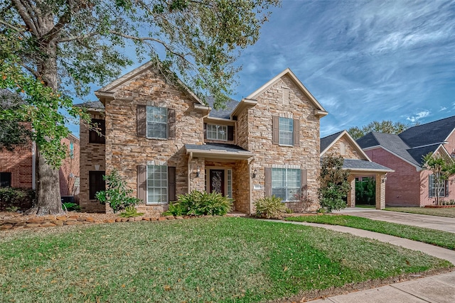 view of front of property featuring stone siding and a front yard