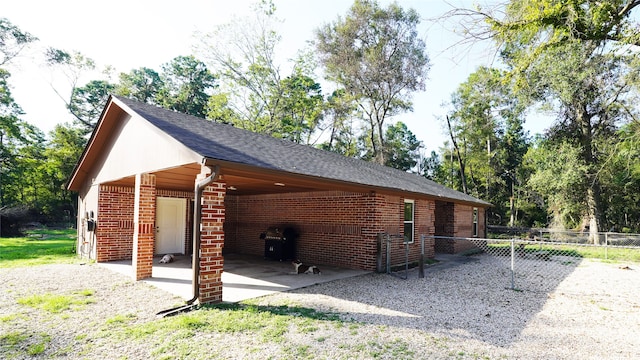 surrounding community with a patio