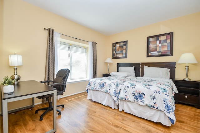 bedroom with light wood-type flooring