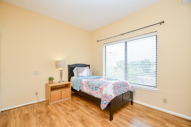 bedroom featuring light hardwood / wood-style floors