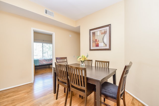 dining area featuring light hardwood / wood-style floors