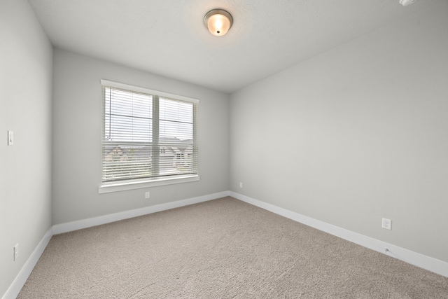 empty room with carpet floors