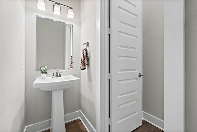 bathroom featuring wood-type flooring