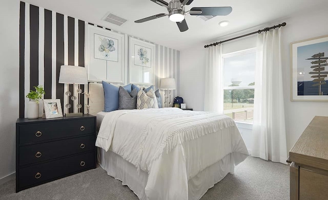 carpeted bedroom featuring ceiling fan