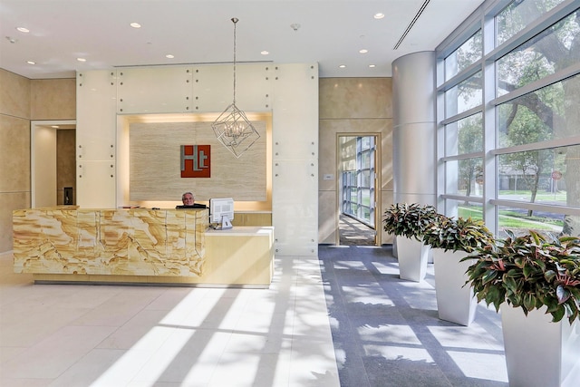 reception area with an inviting chandelier