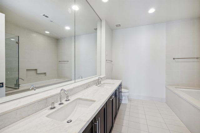 full bathroom with tile patterned floors, vanity, toilet, and separate shower and tub