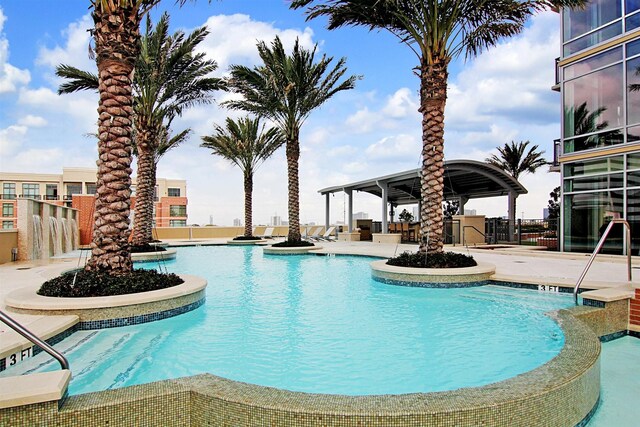 view of pool featuring a patio area