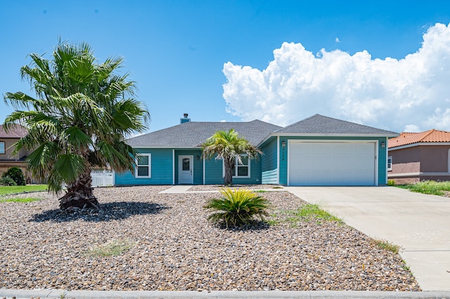 single story home with a garage