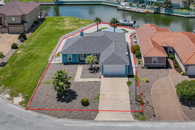 birds eye view of property featuring a water view