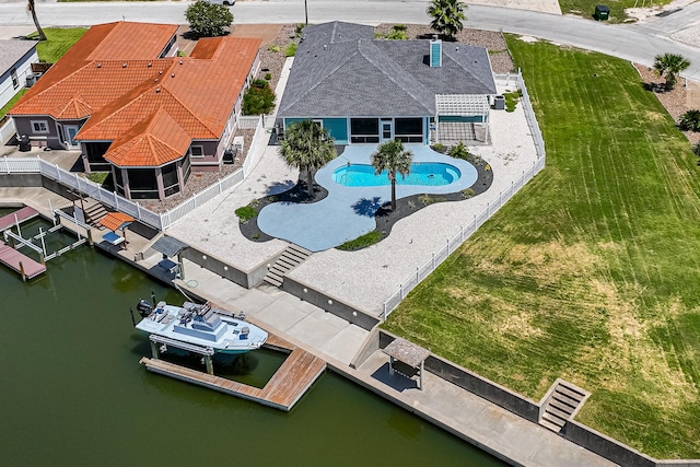 bird's eye view with a water view