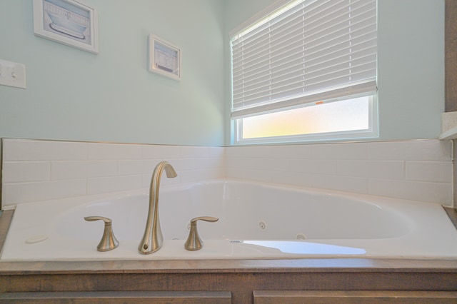 bathroom featuring a tub