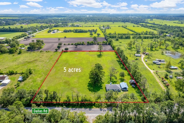 birds eye view of property featuring a rural view