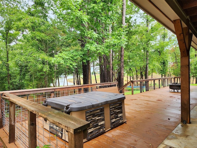 deck featuring a fire pit