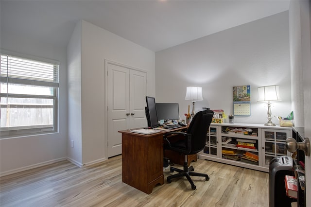 home office featuring light hardwood / wood-style floors