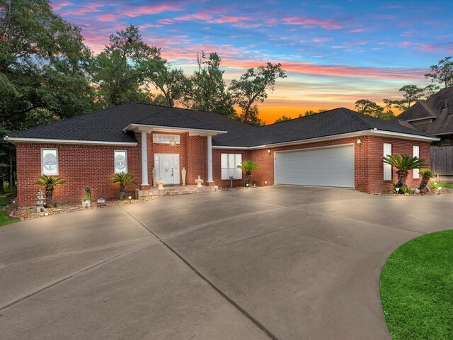 prairie-style home featuring a garage