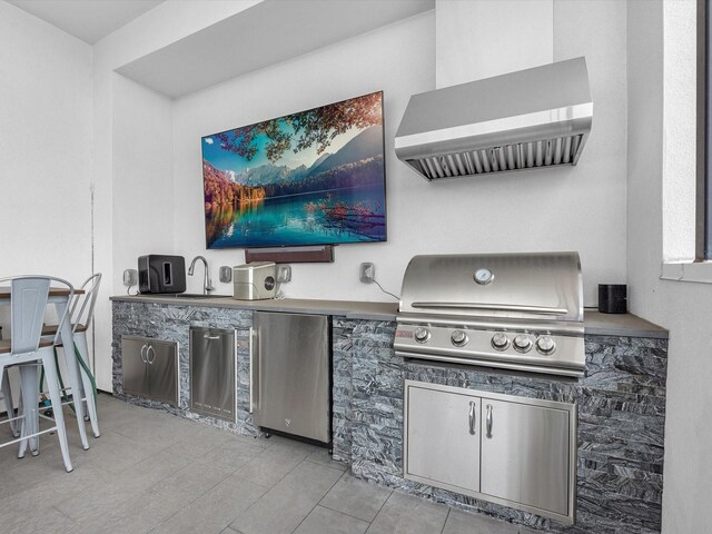 interior space featuring sink, an outdoor kitchen, and a grill