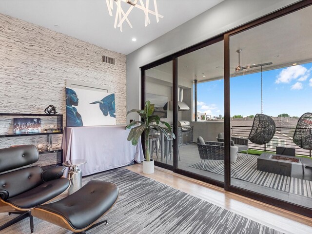 interior space with hardwood / wood-style floors and a chandelier