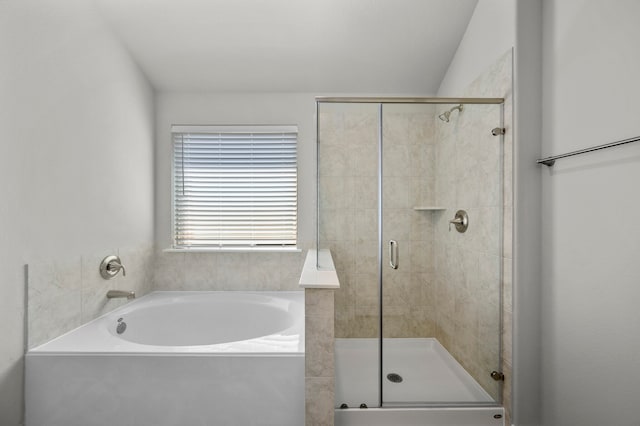 bathroom with independent shower and bath