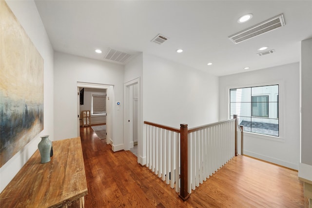 hallway featuring dark hardwood / wood-style flooring