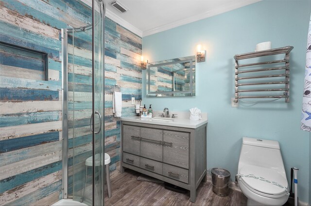 bathroom with toilet, a stall shower, visible vents, and crown molding