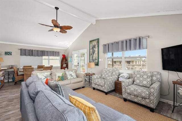 living room with vaulted ceiling with beams, wood finished floors, a ceiling fan, baseboards, and french doors