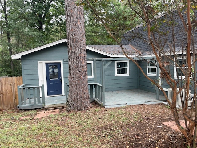 rear view of property featuring a patio