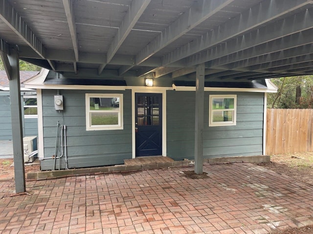 doorway to property featuring a patio