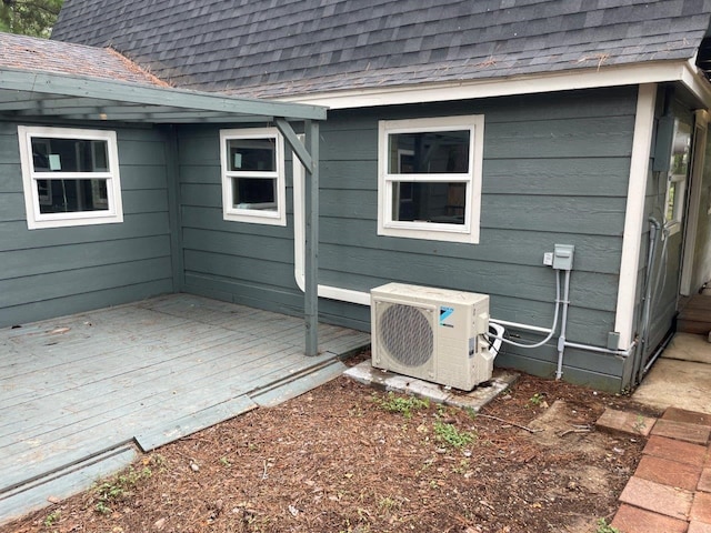 exterior space featuring ac unit