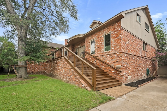 view of home's exterior with a lawn