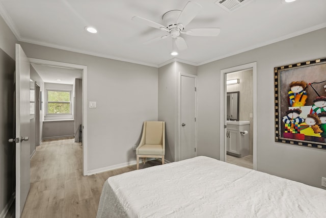 bedroom featuring light wood-type flooring, ceiling fan, connected bathroom, and crown molding