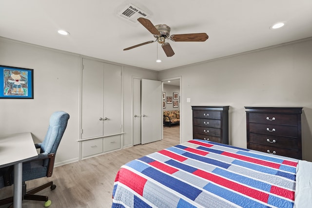 bedroom with ceiling fan and light wood-type flooring