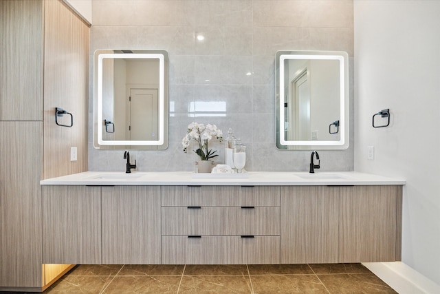 bathroom with vanity and tile patterned floors