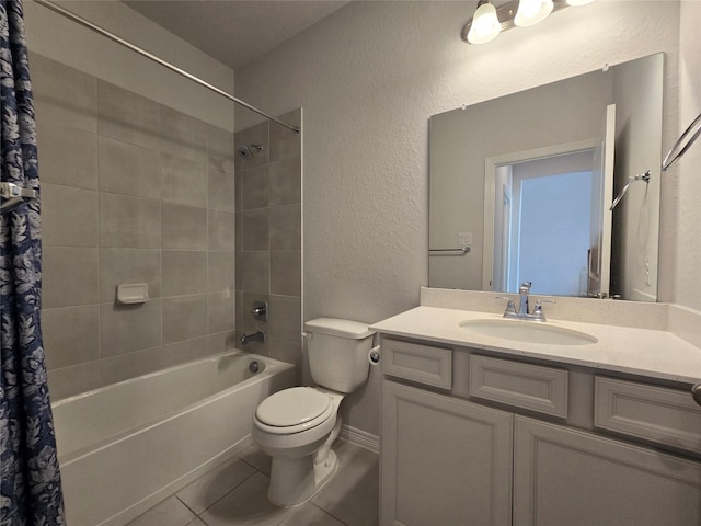 full bathroom with vanity, toilet, tile patterned flooring, and shower / bath combo with shower curtain