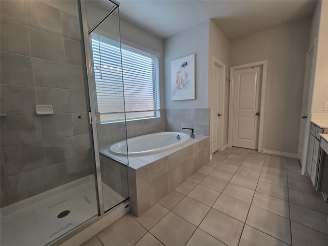 bathroom with vanity, separate shower and tub, and tile patterned floors