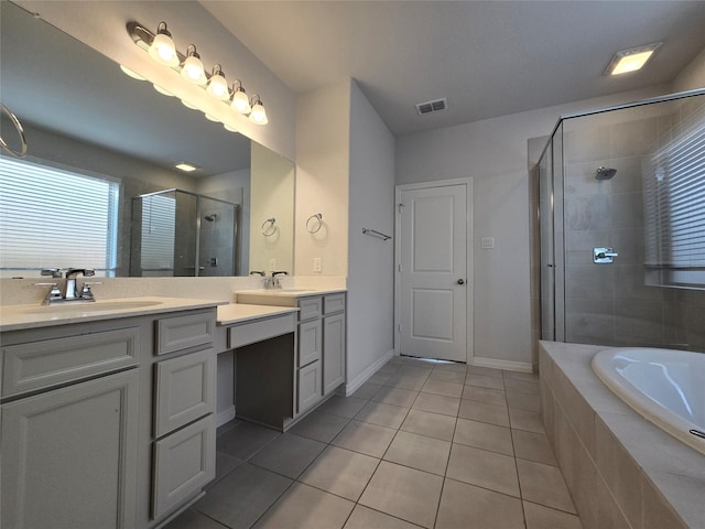 bathroom with vanity, plus walk in shower, and tile patterned flooring