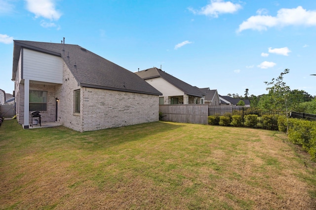 exterior space with a yard