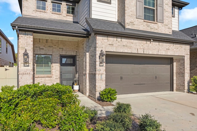 view of front of property featuring a garage