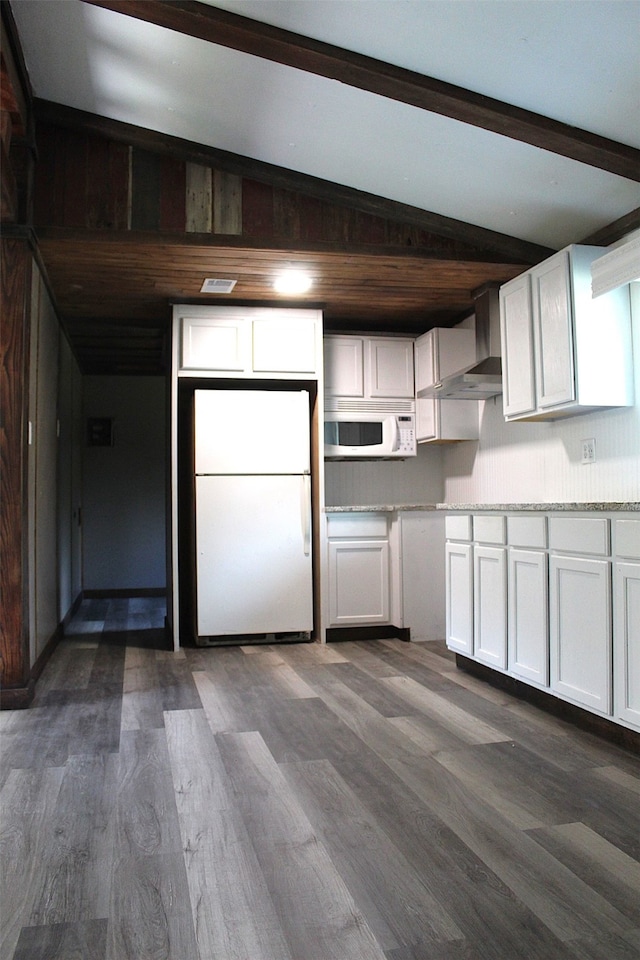 kitchen with white cabinetry, wood-type flooring, wall chimney exhaust hood, and white appliances