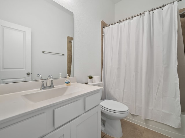 full bathroom with vanity, tile patterned flooring, toilet, and shower / bath combo