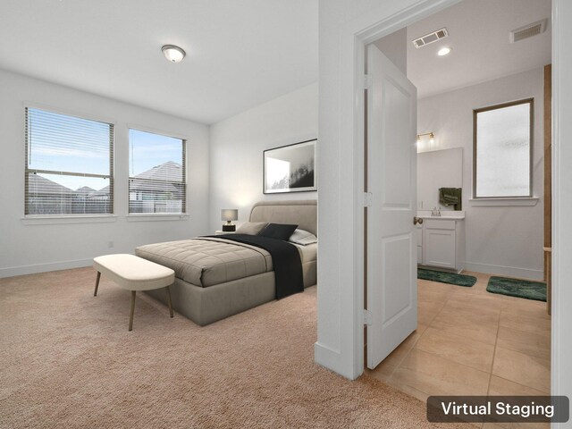 bedroom featuring light tile patterned floors