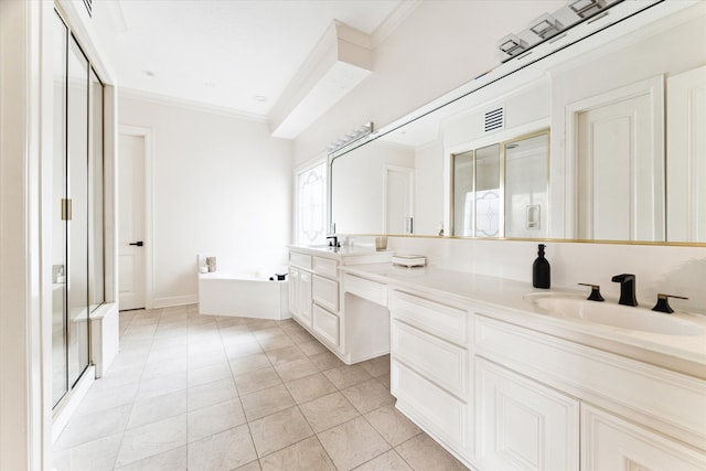 bathroom featuring a tub to relax in, ornamental molding, tile patterned floors, and dual vanity