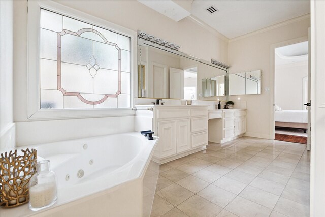 bathroom with crown molding, vanity, hardwood / wood-style flooring, and a wealth of natural light