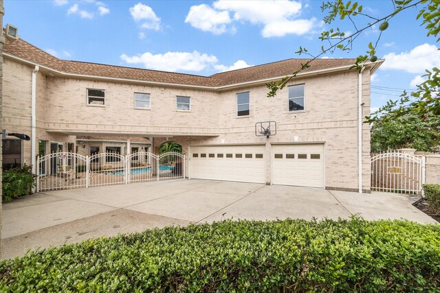 view of front of property featuring a garage