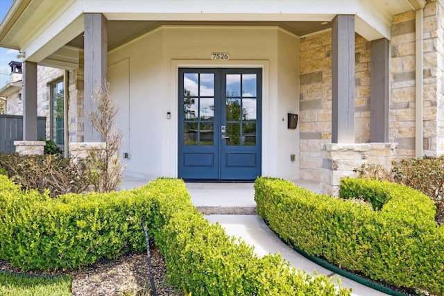 view of exterior entry with french doors