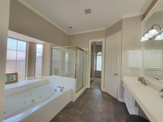 bathroom with tile patterned flooring, vanity, plenty of natural light, and independent shower and bath