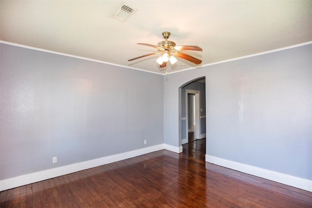 empty room with ceiling fan, ornamental molding, and hardwood / wood-style flooring